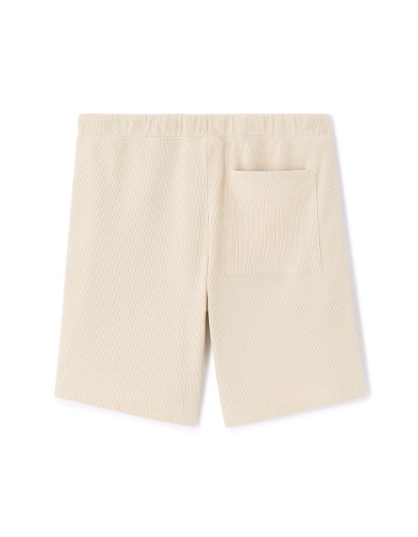 Dandadan - Short beige de Mémé Turbo