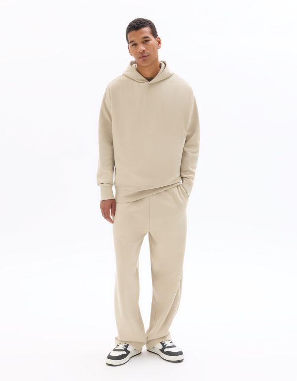 Jogging loose en maille interlock - beige clair