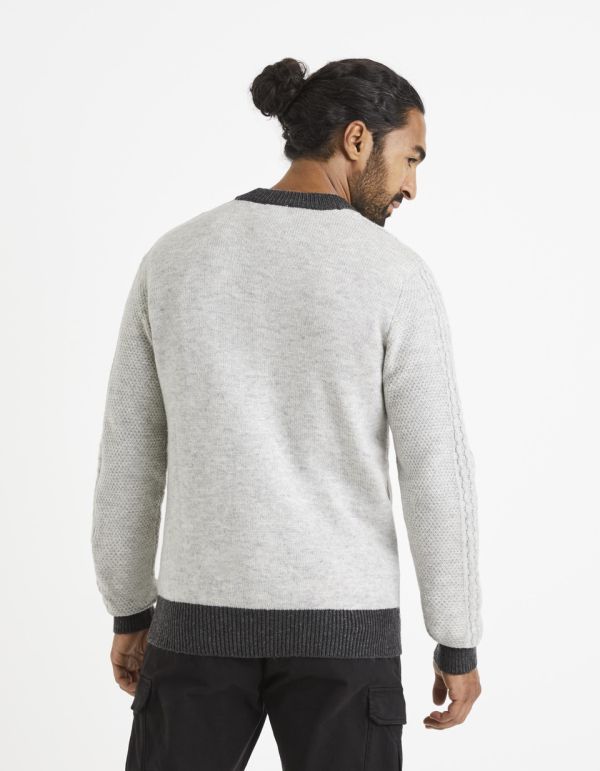 Pull col rond torsades