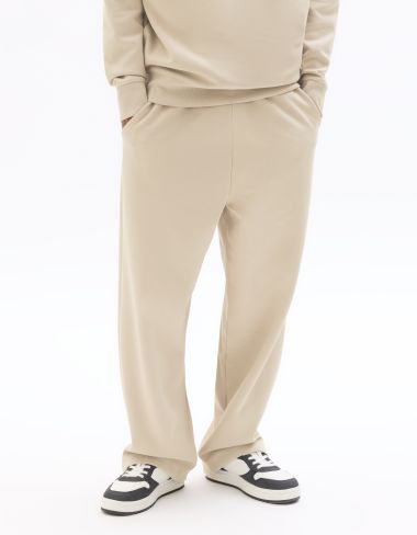 Jogging loose en maille interlock - beige clair